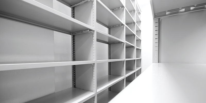 Empty mobile shelving unit made of steel.